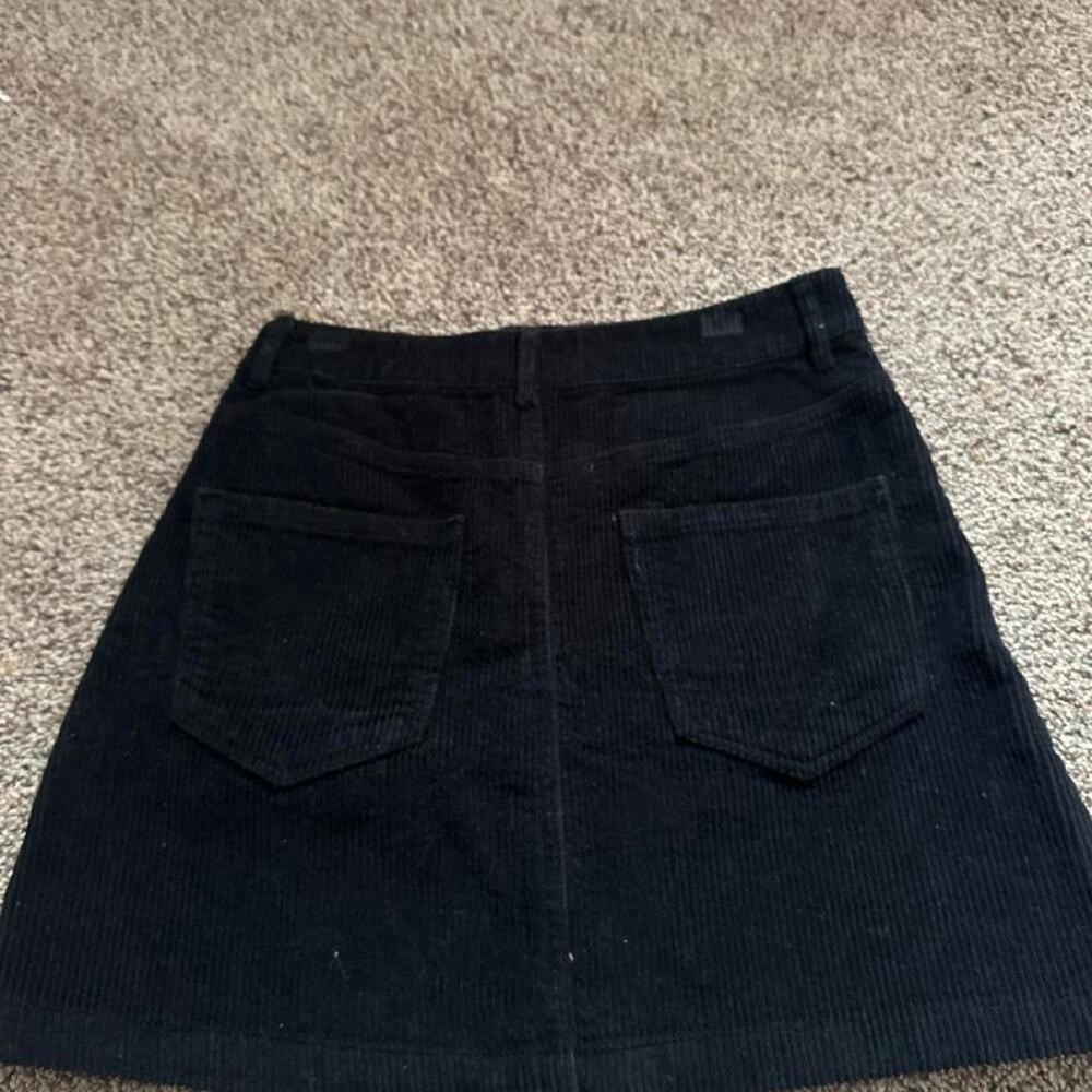 Black corduroy skirt with pockets